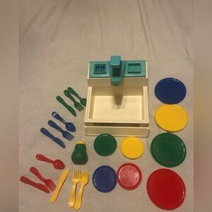 Vintage Fisher Price toy sink with dishes